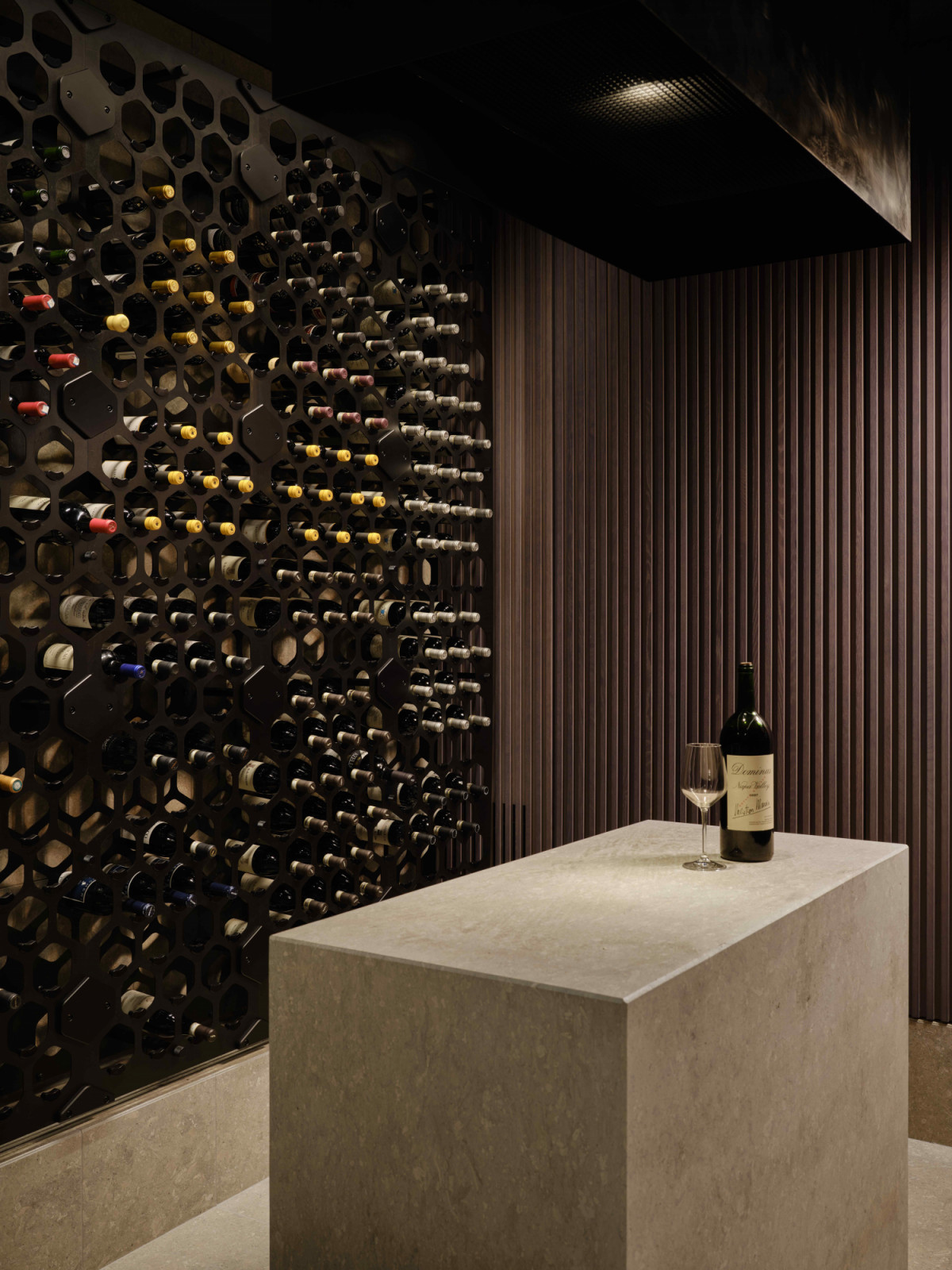 A limestone podium stands in the centre of the cellar