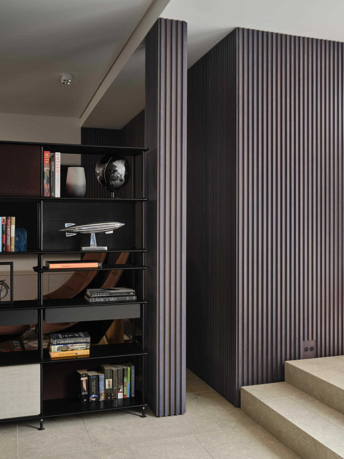 Grey-stained oak battens offer depth and rhythm