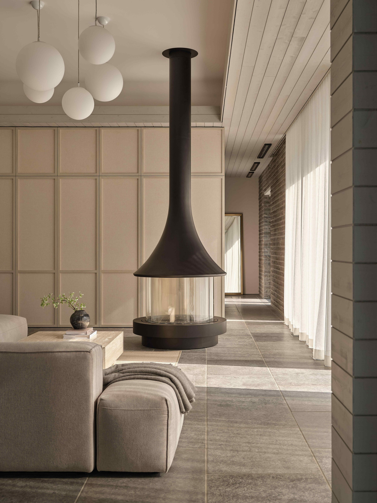Contrasting the restrained palette of the main residence
