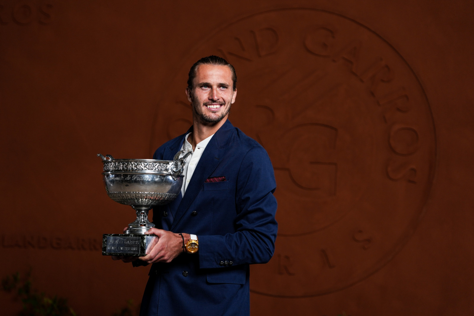 PARIS, FRANCE - JUNE 07: Alexander Zverev of Germany poses for a photo with the Coupe des Mousquetaires trophy following his victory over Flavio Cobolli of Italy in the Men’s Singles Final match during Day Fifteen of the 2026 French Open at Roland Garros on June 07, 2026 in Paris, France. (Photo by Shi Tang/Getty Images)
