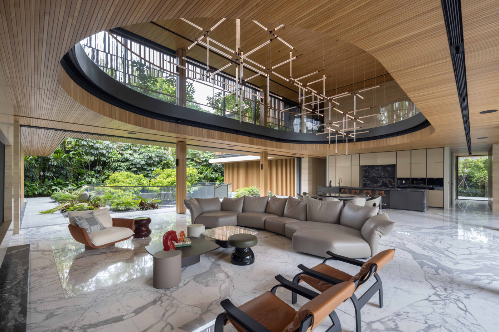 The living room includes a Man of Parts Rua Ipanema armchair, Cassina Woodline chairs, Giorgetti Mia & Woody tables, an Edra Standard sofa and a custom crystal pendant from Preciosa