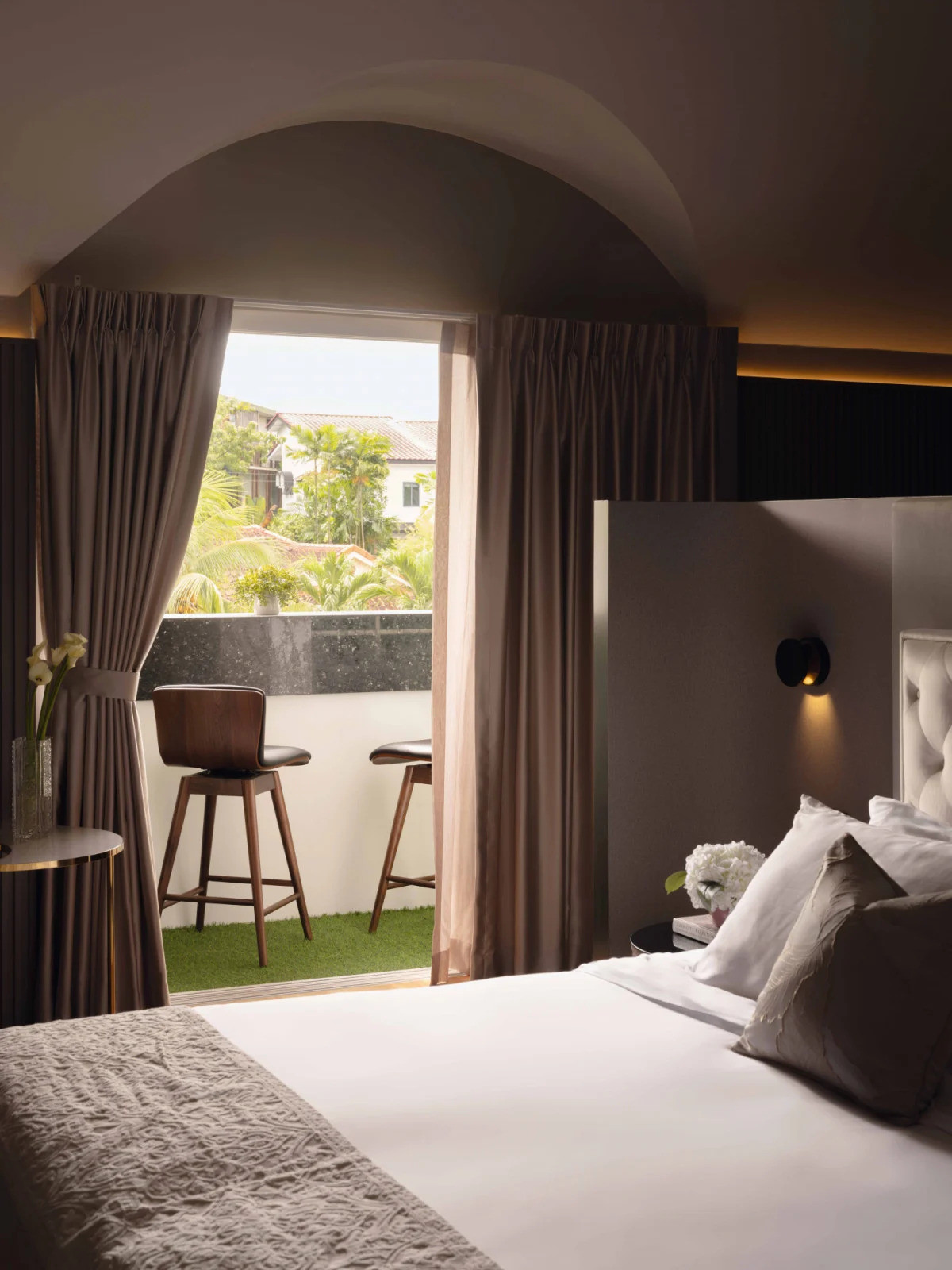 A peek at the outdoor greenery from the bedroom