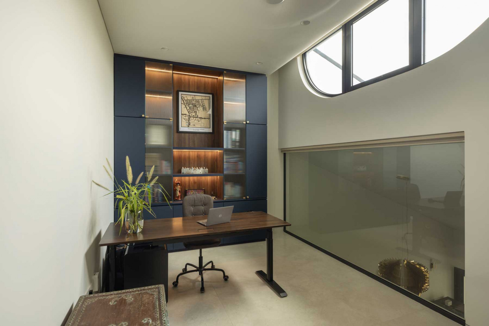 Twin windows create the sense of space and imbue the home office with lots of natural light