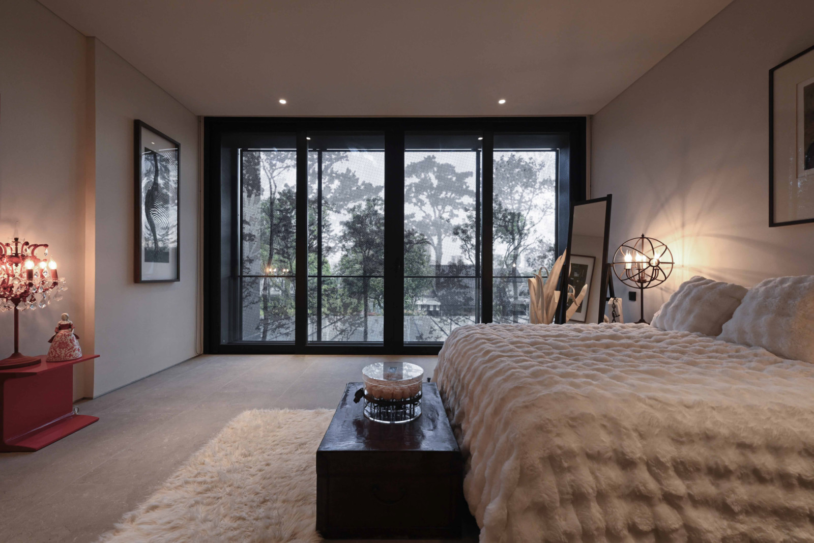 Even within the bedroom, artworks permeate the space