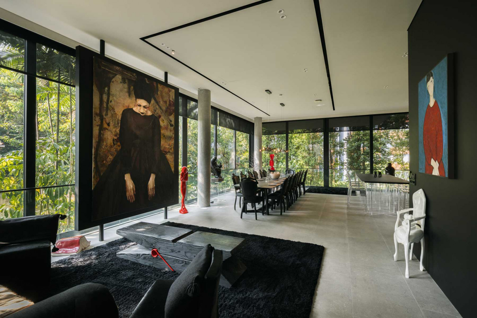 Once displayed in the attic of her former home, this portrait of Caroline Lim by Spanish artist Lita Cabellut now anchors the open-plan living and dining area