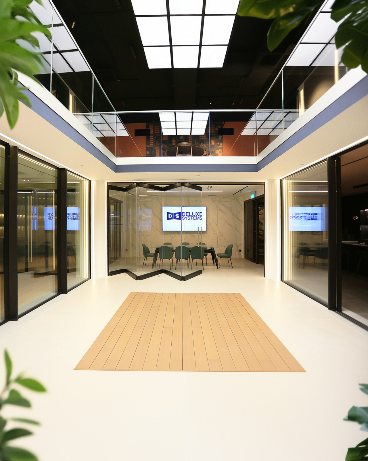 The double-volume heart of the Deluxe Systems showroom doubles as an event space