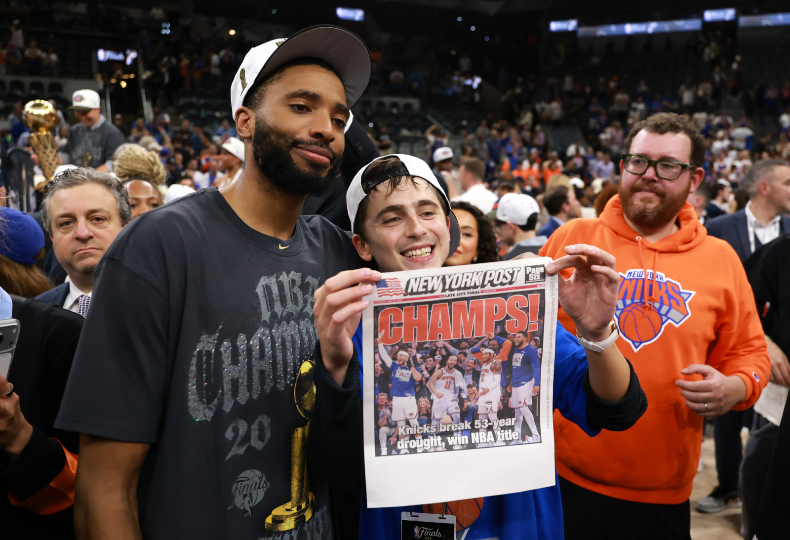 Timothée Chalamet celebrates with Mikal Bridges of the New York Knicks after the victory against the San Antonio Spurs in Game Five of the 2026 NBA Finals (Photo: Gregory Shamus/Getty Images)