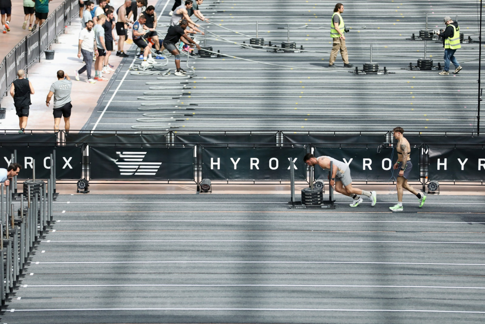 The sled push develops lower-body drive, bracing strength and sustained power output, making it one of the most demanding stations in Hyrox training (Photo: Mathieu Improvisato/Unsplash)