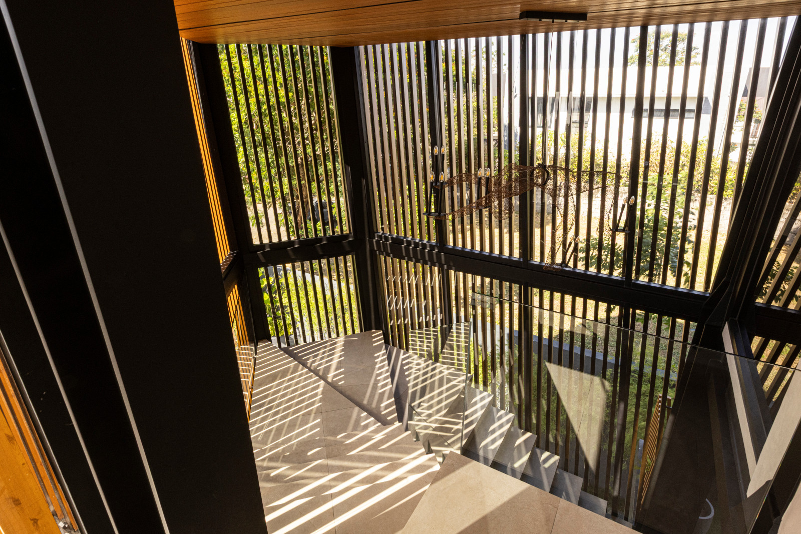 Ventilation and natural light permeate the Halcyon House in Alabang, Manila by Barchan + Architecture