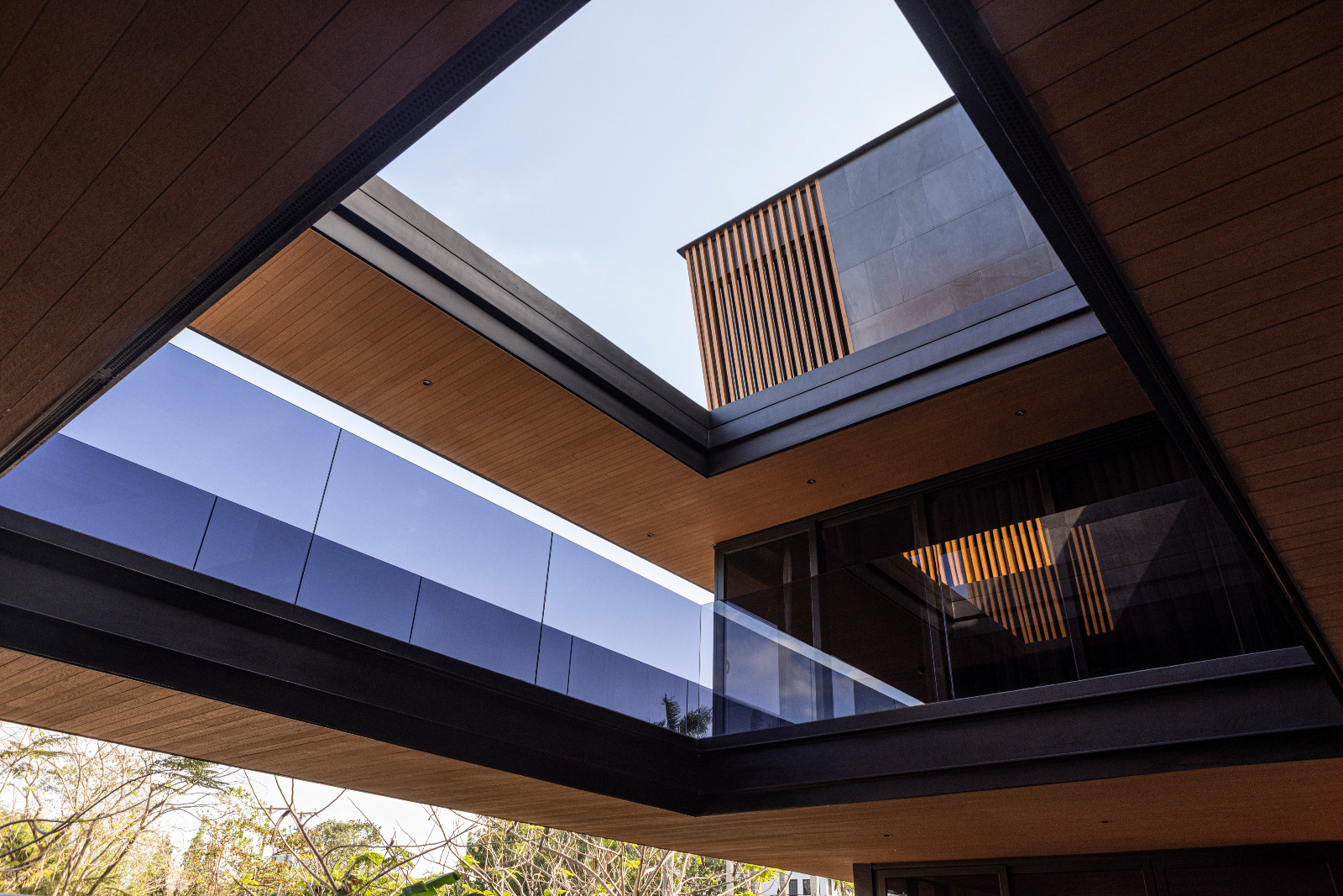 Innovative architectural forms frame the Halcyon House in Alabang, Manila by Barchan + Architecture