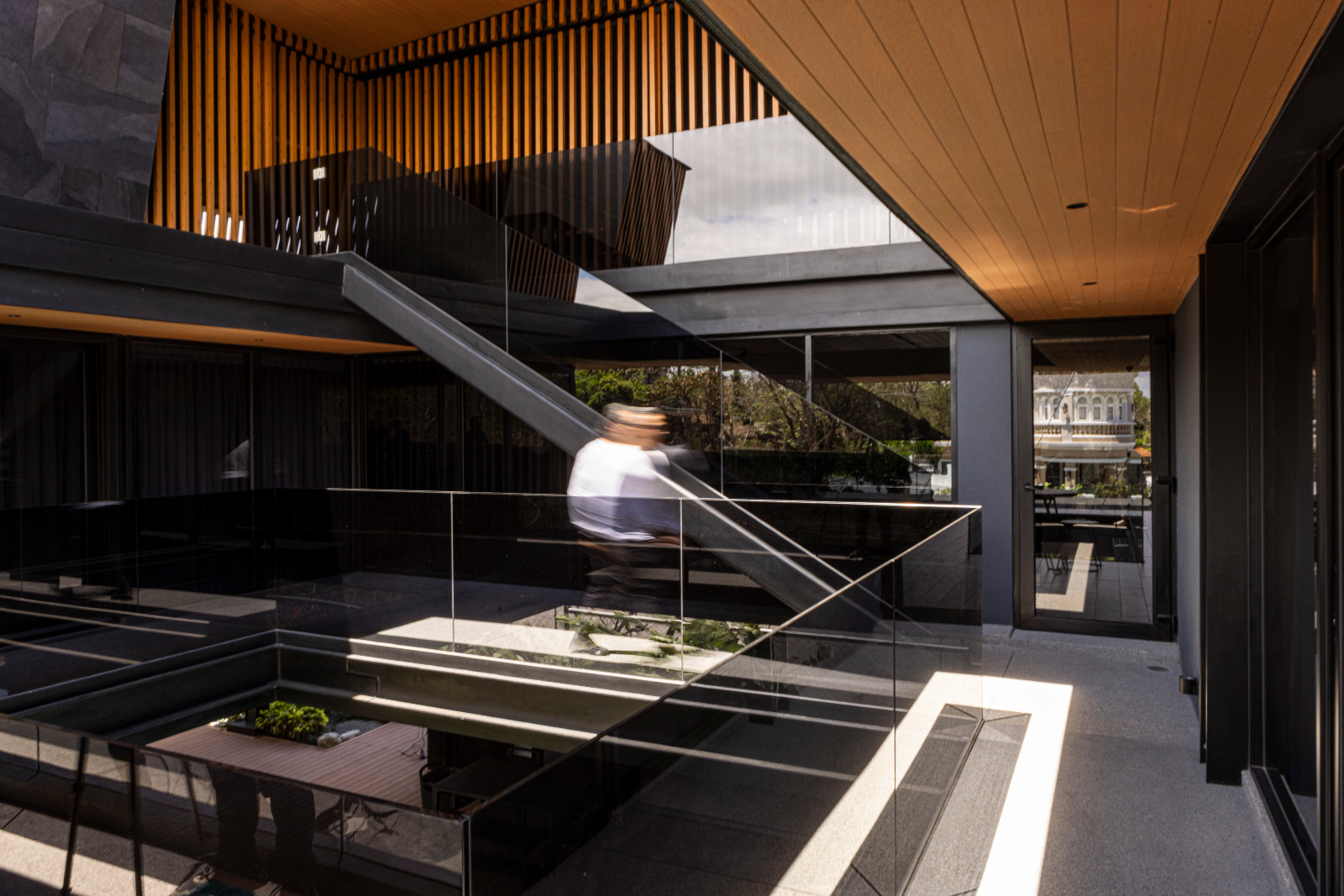 Innovative architectural forms and natural light permeate the Halcyon House in Alabang, Manila by Barchan + Architecture
