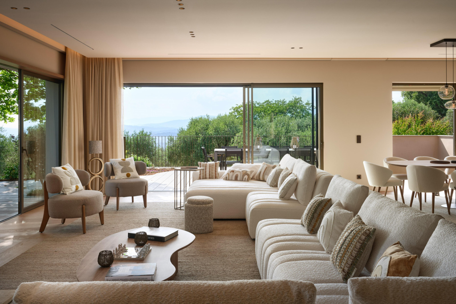 The traditional villa has been updated with an open, fluid space that connects to its landscape