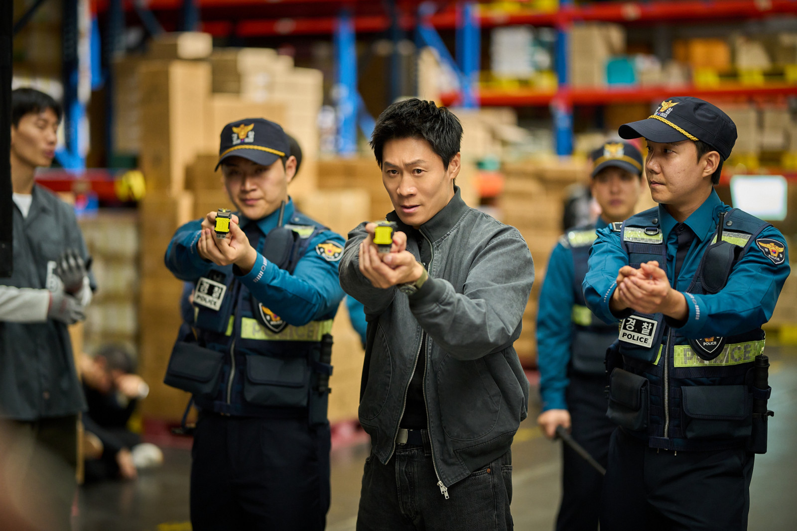 Husbands in Action / Jin Sun-kyu as Choong-sik in Husbands in Action Cr. Cho Wonjin/Netflix © 2026