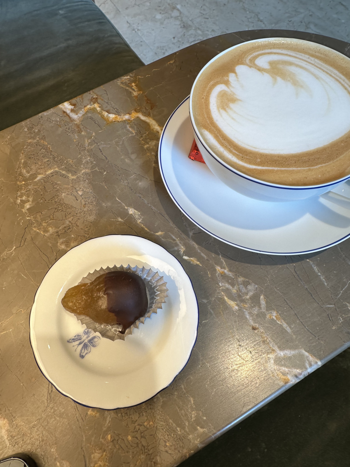 A cup of coffee served with Pan Dolce Antica Genova in Genoa, Italy