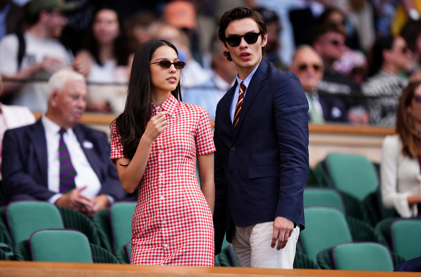 Olivia Rodrigo and Louis Partridge in the Royal Box on day three of the 2025 Wimbledon Championships at the All England Lawn Tennis and Croquet Club, London. Picture date: Wednesday July 2, 2025. (Photo by Mike Egerton/PA Images via Getty Images)