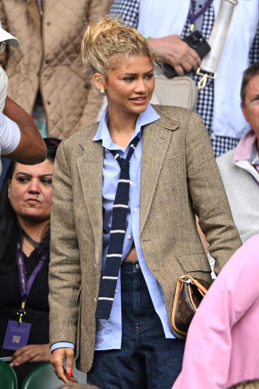LONDON, ENGLAND - JULY 13: Zendaya, wearing Ralph Lauren, attends day thirteen of the Wimbledon Tennis Championships at the All England Lawn Tennis and Croquet Club on July 13, 2024 in London, England. (Photo by Karwai Tang/WireImage)