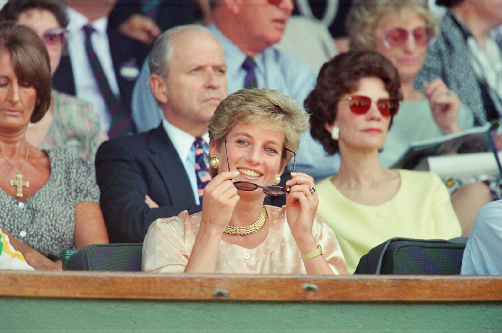 Princess Diana, Princess of Wales, attends the 1993 Men's Singles Wimbledon Tennis Final. She wears or attends to her sunglasses for most of the pictures on this sunny day as it was. The Princess is shown sitting next to her mother Frances Shand Kydd. Regarding the match, Pete Sampras defeated Jim Courier 7ø(7ø), 7ø(8ø), 3ø, 6øin the final to win the Gentlemen's Singles title at the 1993 Wimbledon Championships. This was the first of Pete's Open Era record of seven Wimbledon titles. Picture taken 4th July 1