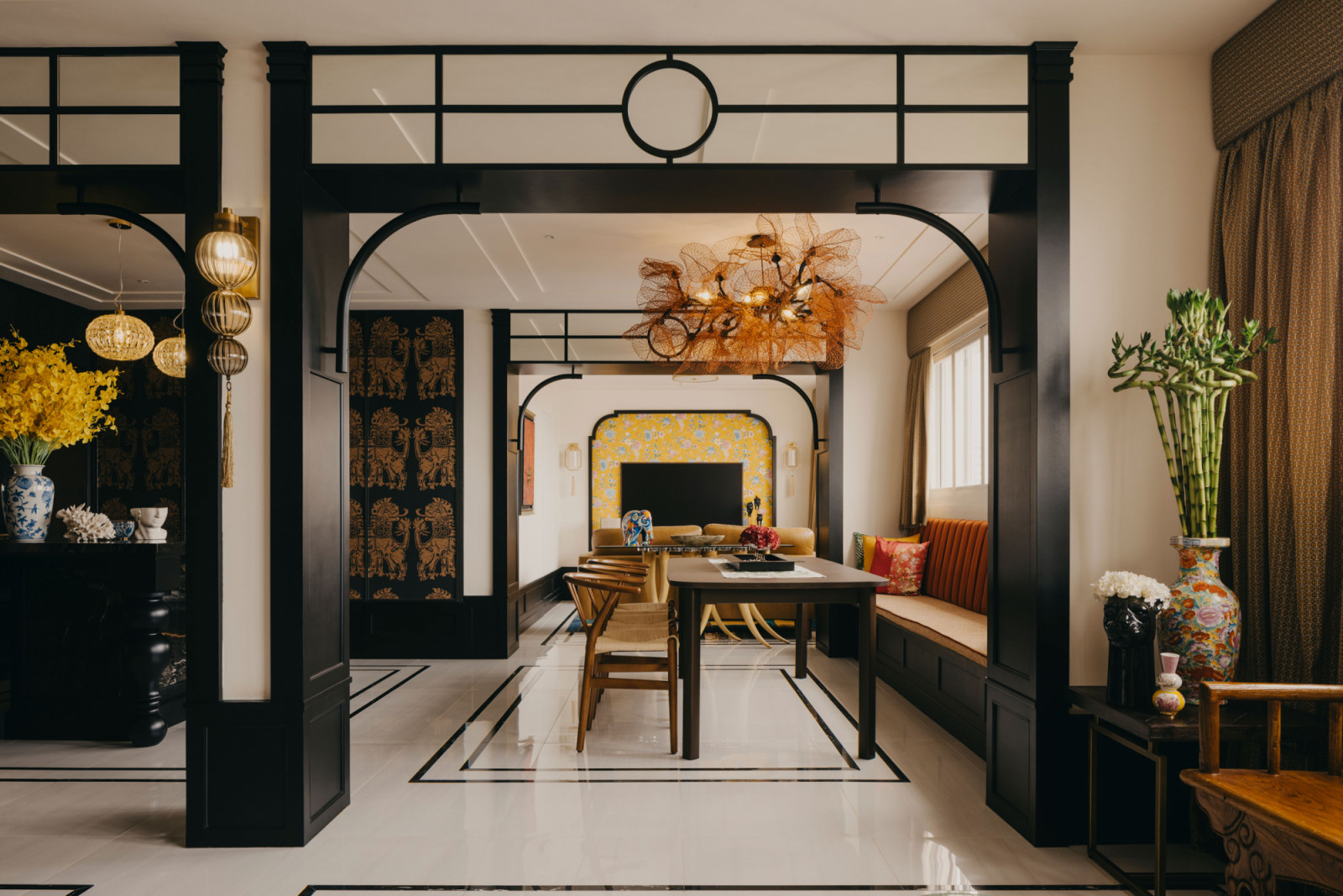 Mirror-lined transoms, arches and ceiling detailing were introduced to soften transitions, create visual openness and add depth to the relatively low ceiling heights