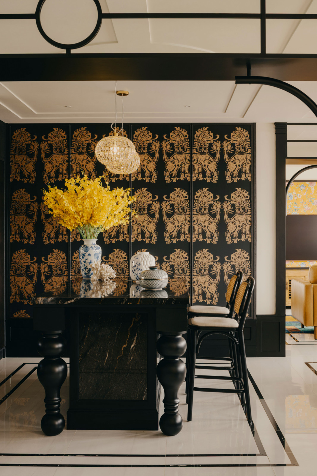 Loose furniture pieces, antiques and layered materials were prioritised over extensive built-in carpentry