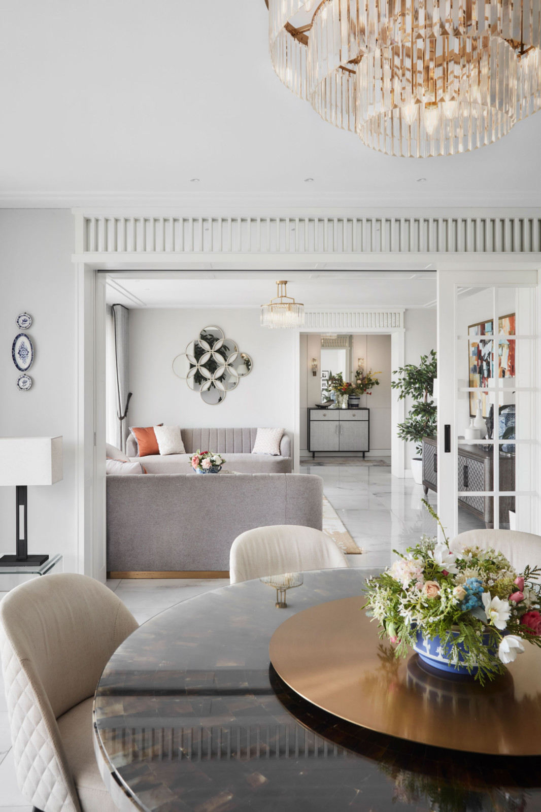 Large continuous spaces, such as the living and dining areas, were intentionally divided into more defined yet interconnected zones