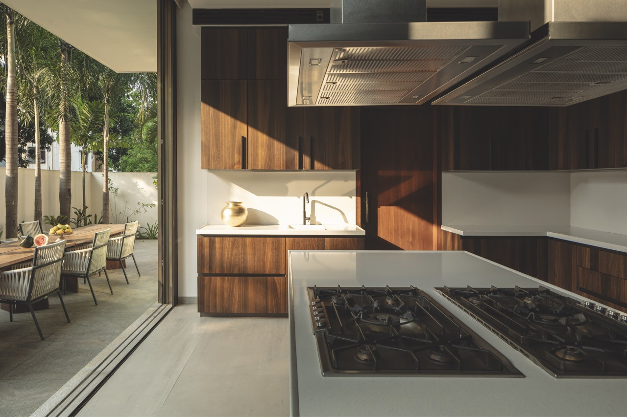 The ground-floor kitchen, which opens directly out to the outdoor dining area and garden