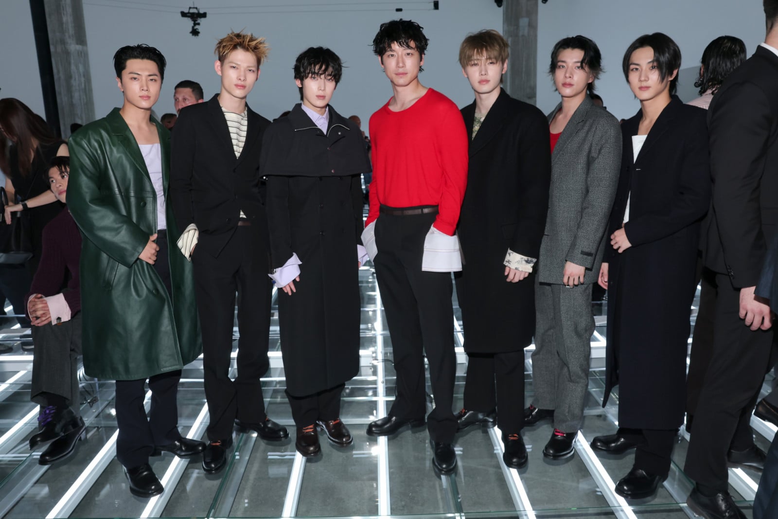 Kentaro Sakaguchi (center) and Enhypen with Kentaro Sakaguchi (center) at the Prada Spring/Summer 2027 Menswear Fashion Show (Photo: Jacopo Raule/Getty Images for Prada)