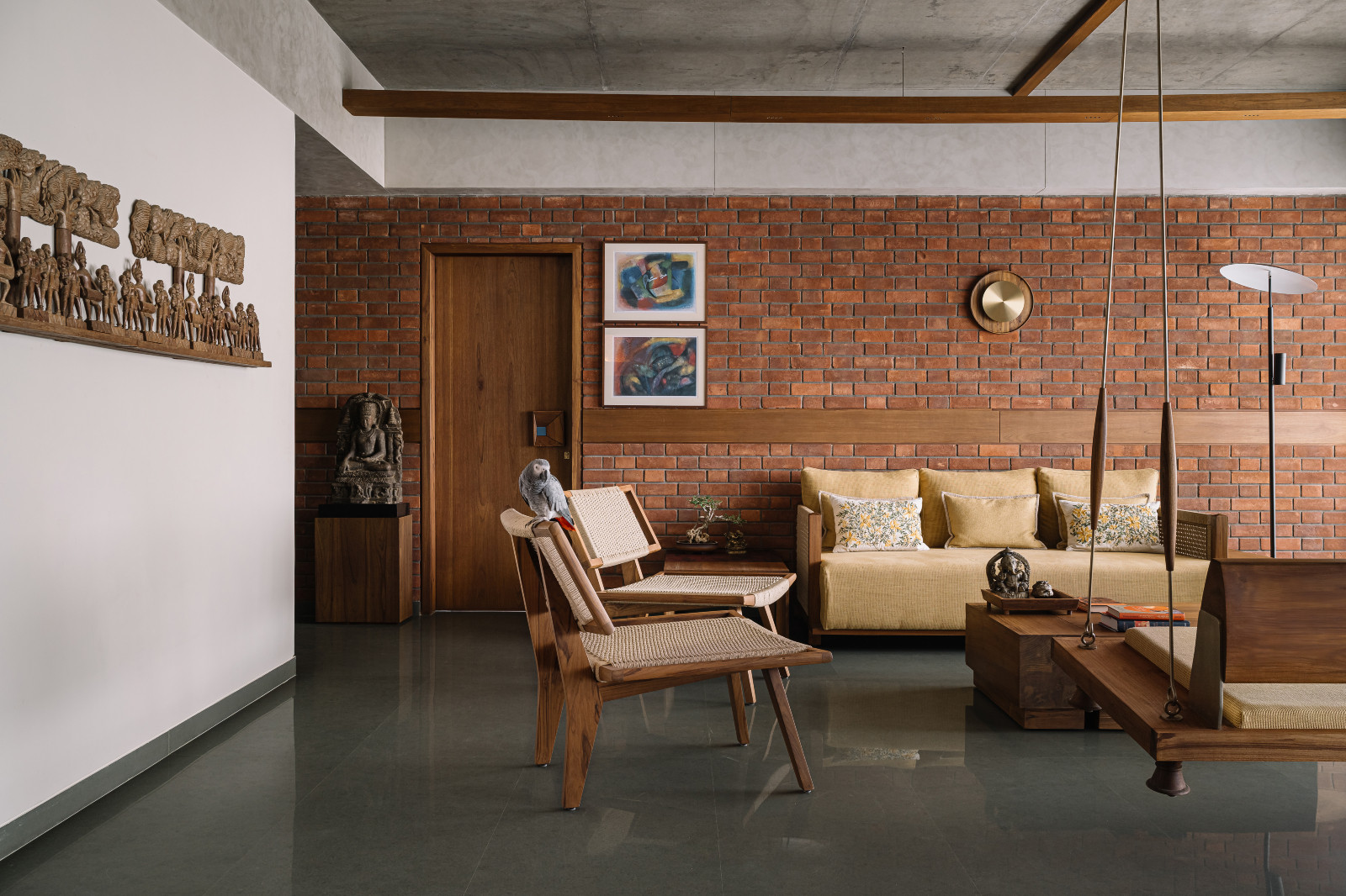 The living room in a Corbusian-inspired family apartment in Ahmedabad, India, designed by Studio Saransh