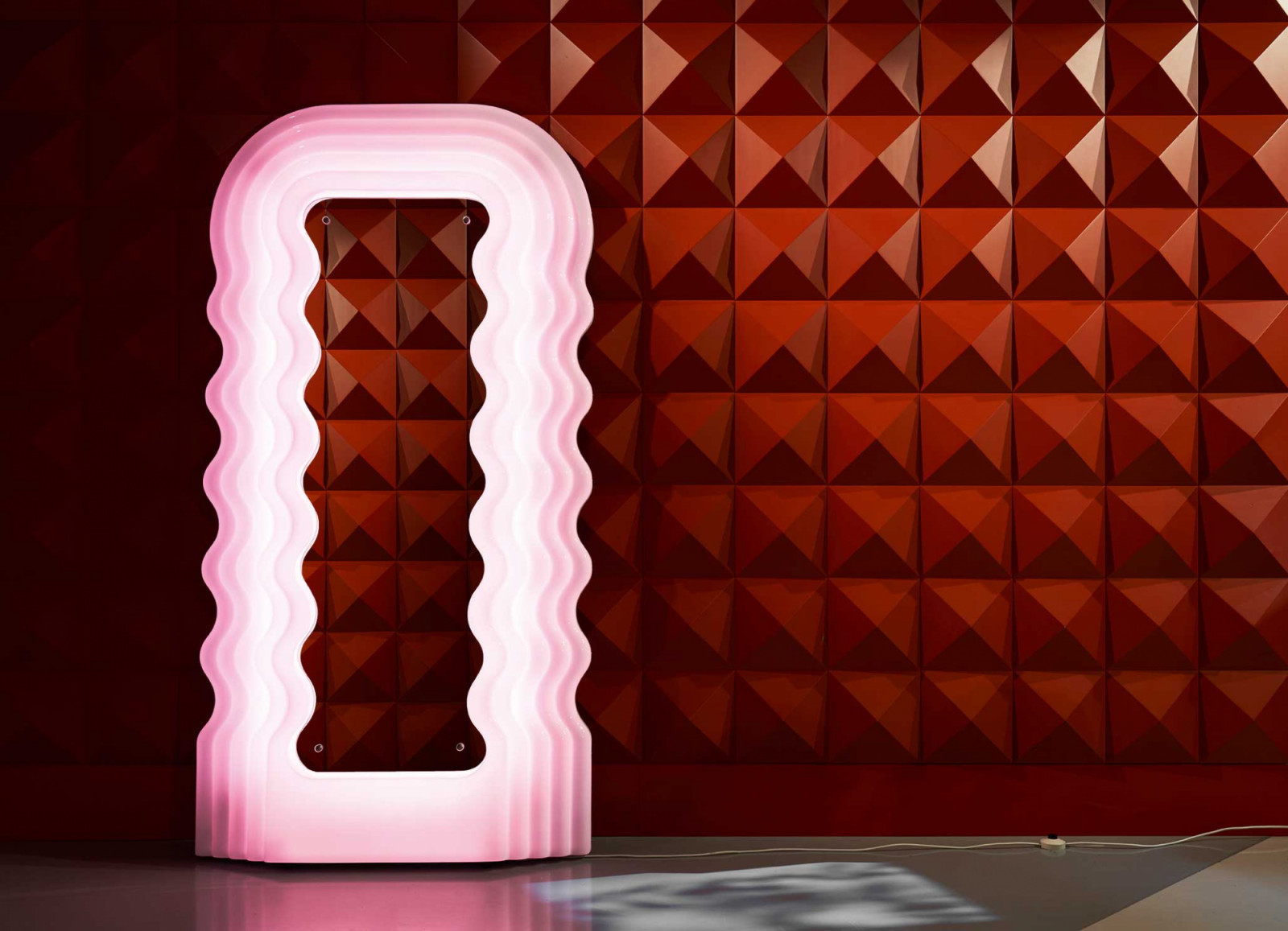 Ettore Sottsass’s Ultrafragola for Poltronova is a sinuous mirror-lamp whose name translates as “ultra strawberry”