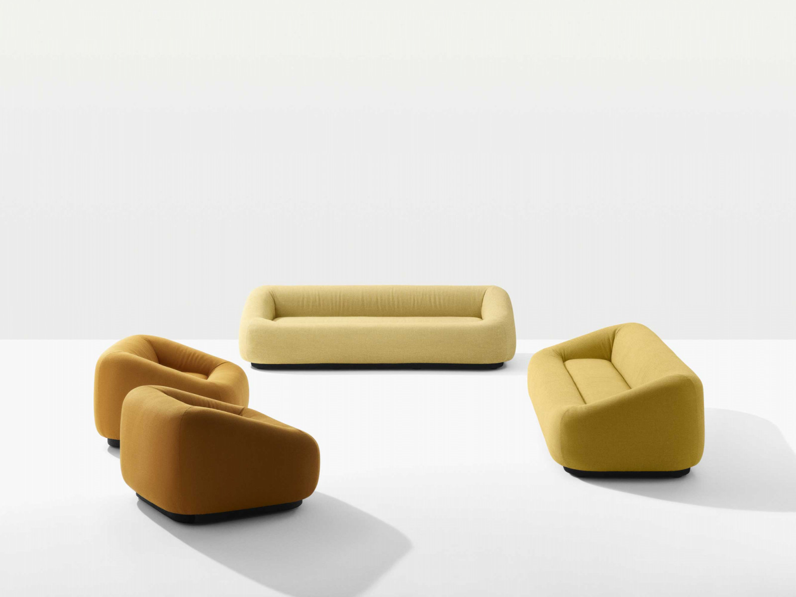 Arper’s Aom sofa collection by Jean-Marie Massaud sports a delicious citrus colour palette