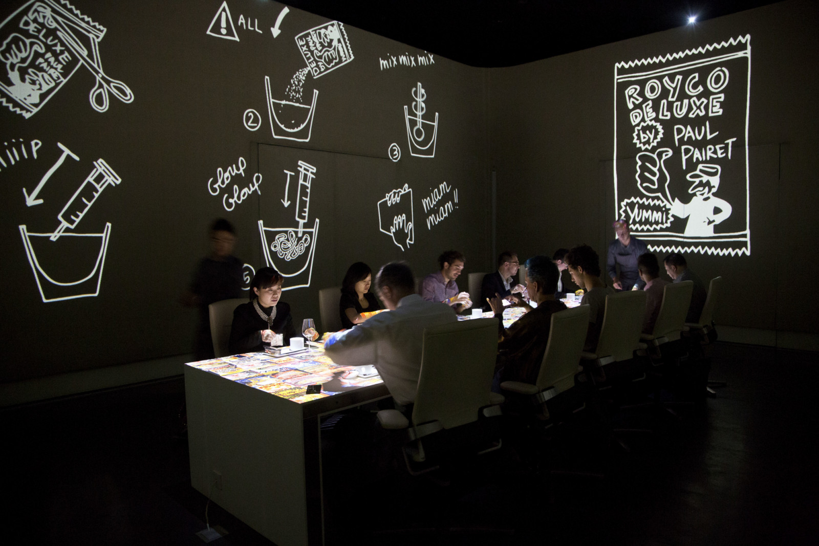 Diners being entertained at Chef Paul Pairet's Ultra Violet (UV) restaurant in Shanghai, China on 28 September 2013. Serving only a dozen patrons per meal, UV is quickly making a reputation for itself as it combines the senses of taste, sound, and sight to the extreme. (Photo by Qilai Shen/In Pictures Ltd./Corbis via Getty Images)