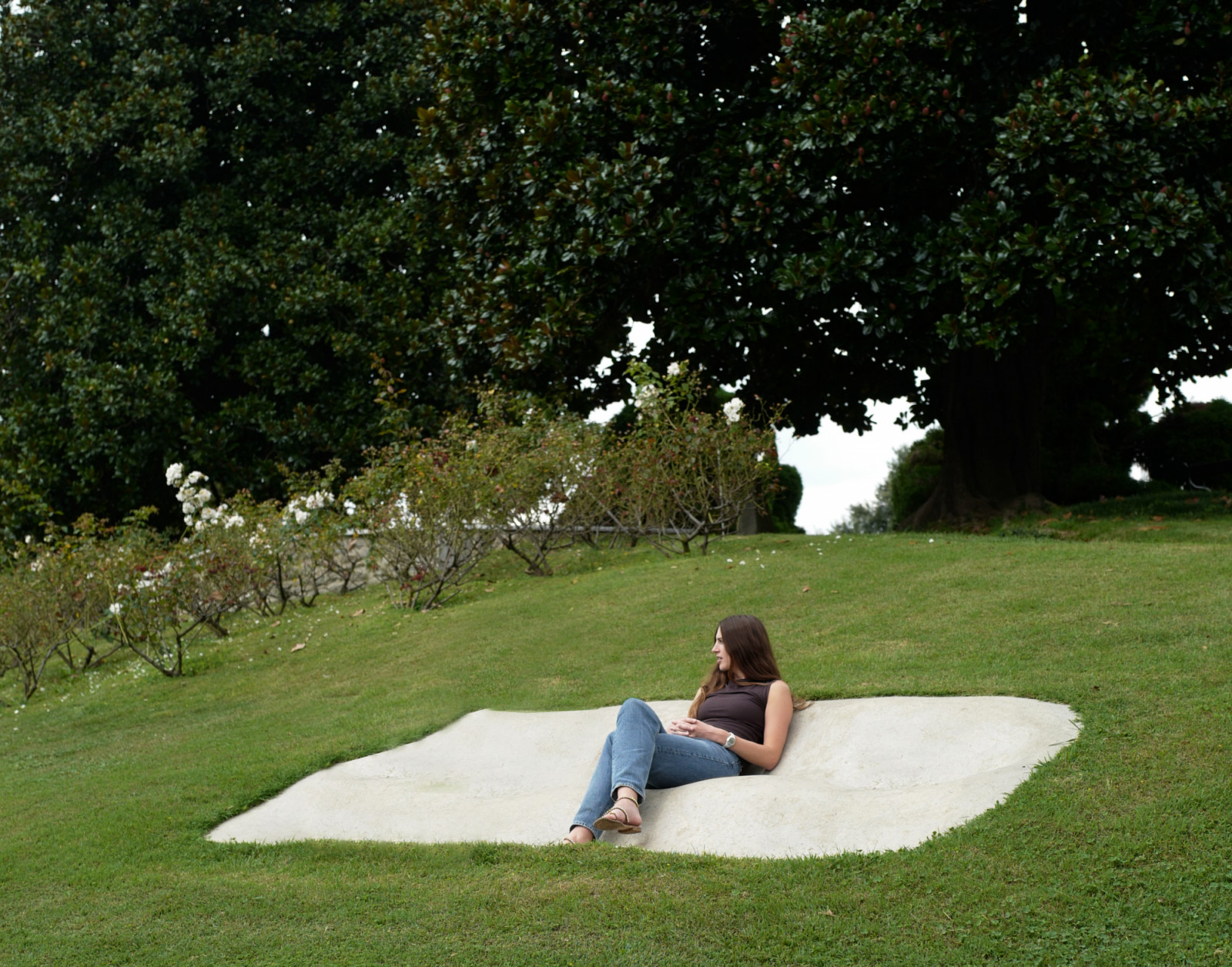At Villa Ponti in Italy, Isabella Ellis pauses within a playful landscape designed to invite movement, interaction and a deeper connection with the garden