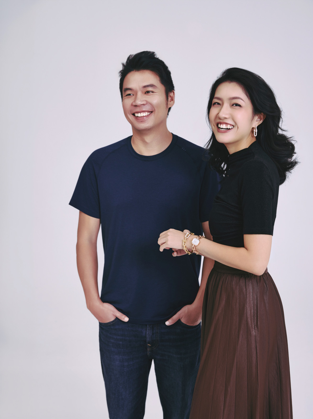 Patsnap co-founder and CEO Jeffrey Tiong and clinician innovator Jasmine Ong. Ong wears Tiffany & Co HardWear large link earrings in rose gold set with pavé diamonds, HardWear large link bracelet in yellow gold set with diamonds, HardWear watch in rose gold set with diamonds and white mother-of-pearl