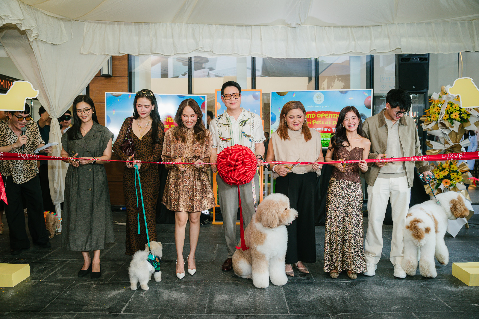 Guests were all smiles as they celebrated the opening of Luxuri Pets' newest branch alongside some adorable four-legged friends (Photo: courtesy of Luxuri Pets)
