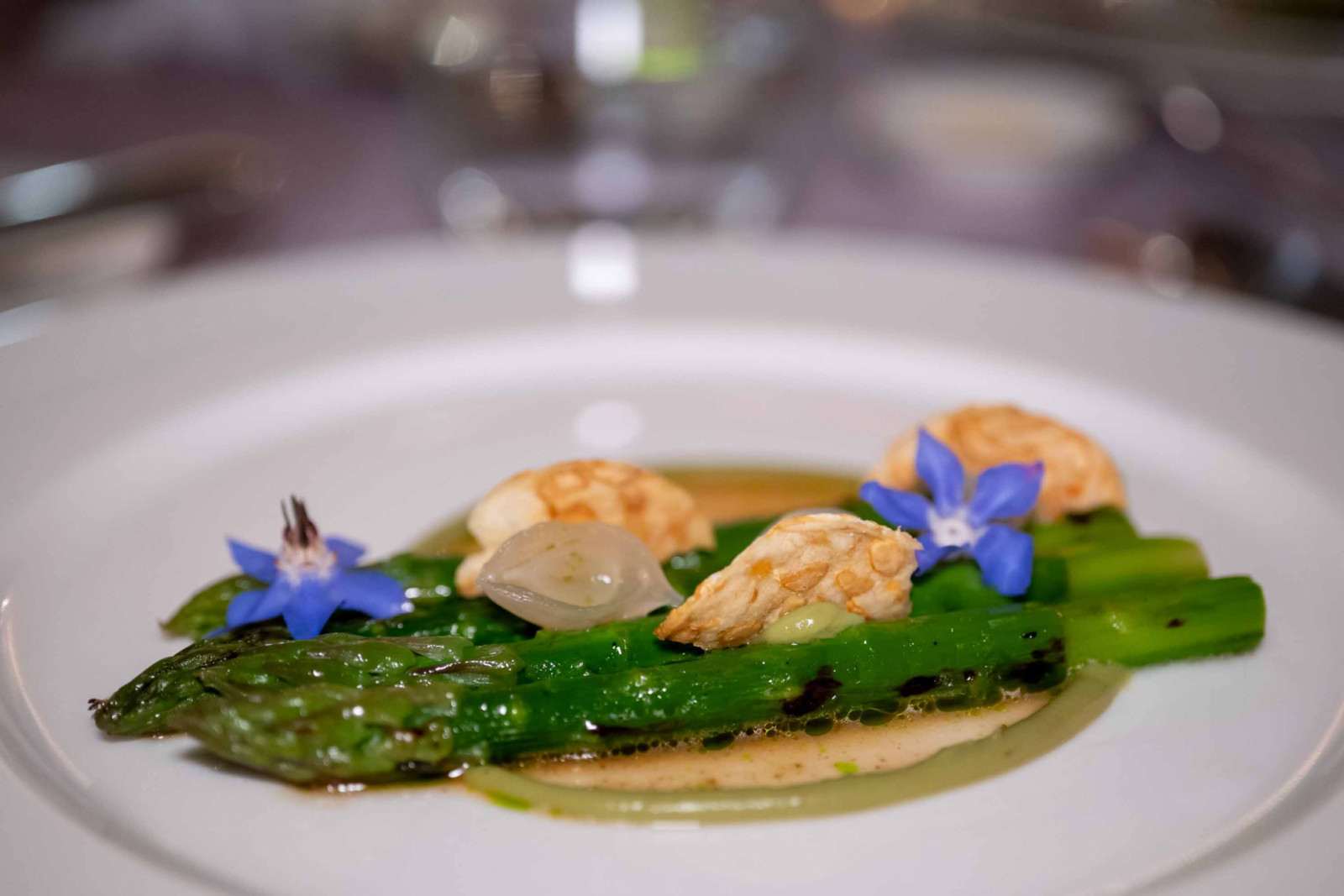 Grilled asparagus with kombu emulsion, pickled pearl onions and avocado