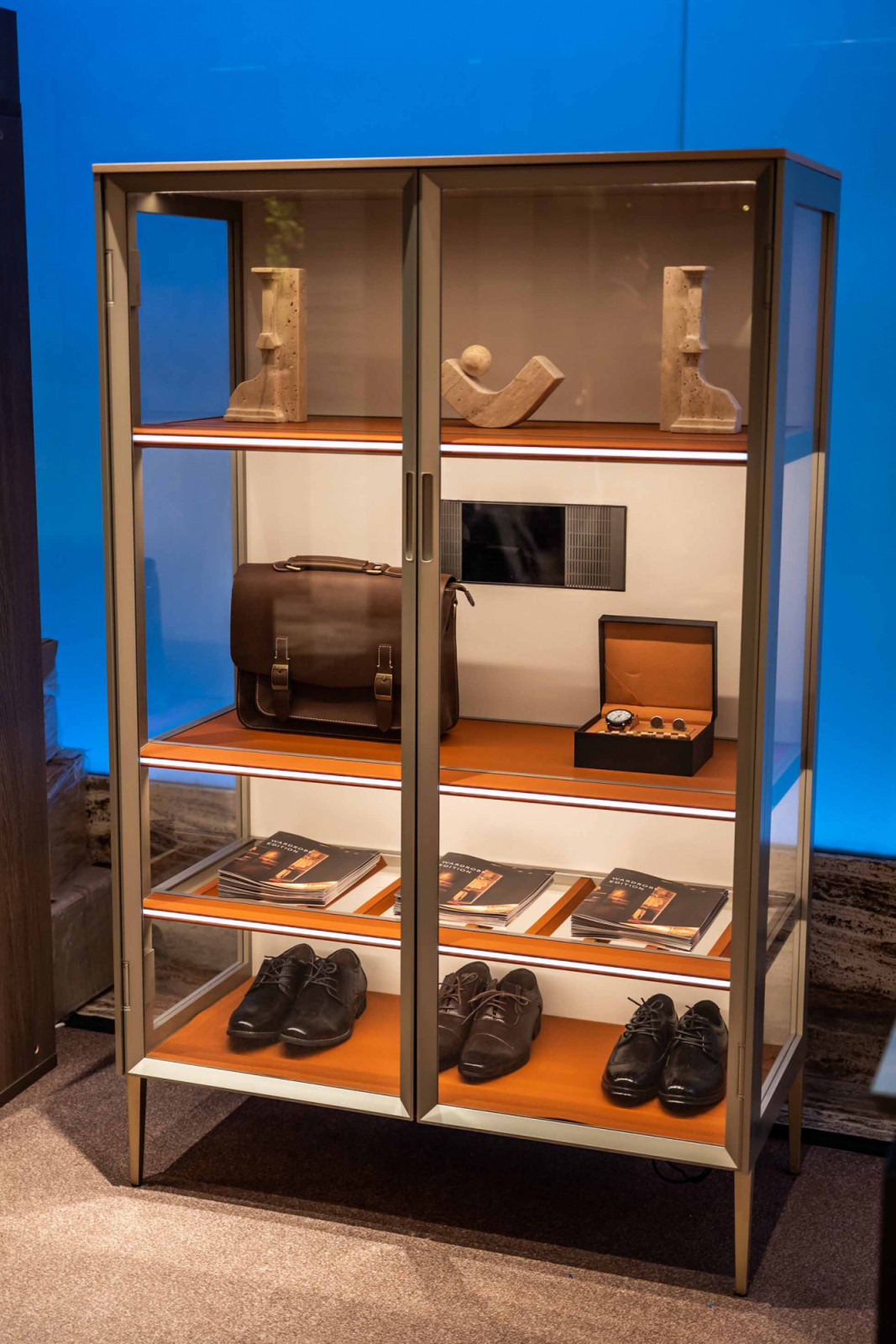 An illuminated glass cabinet by KKPL