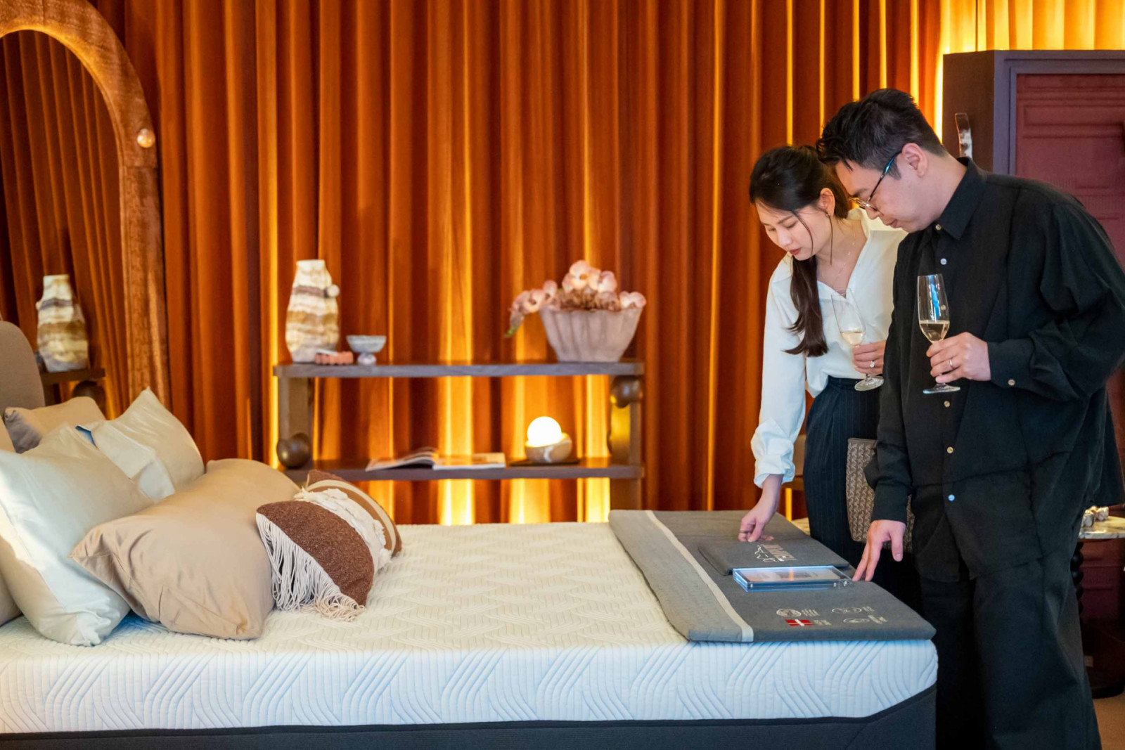 Guests interacting with Tempur display styled by Atelier V&A