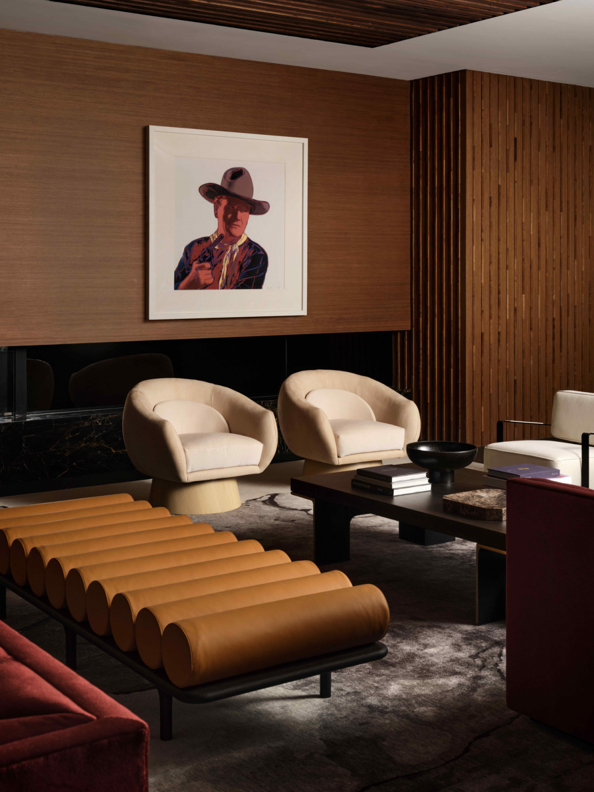 Andy Warhol’s bold Pop Art aesthetic contrasts with the sultry ambience