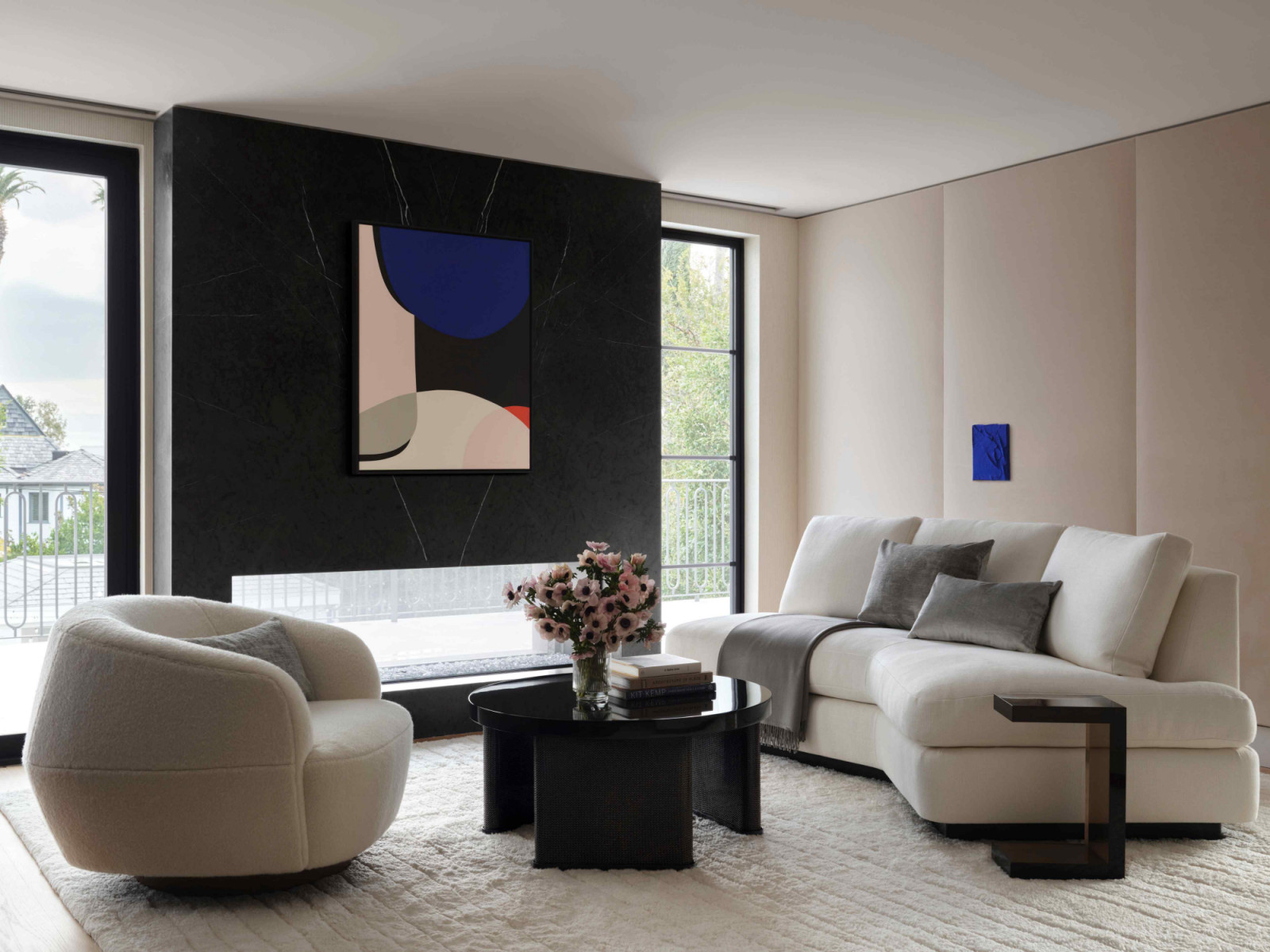 A painting by Francois Bonnel upon the black stone fireplace further enhances the suite’s retreat-like atmosphere