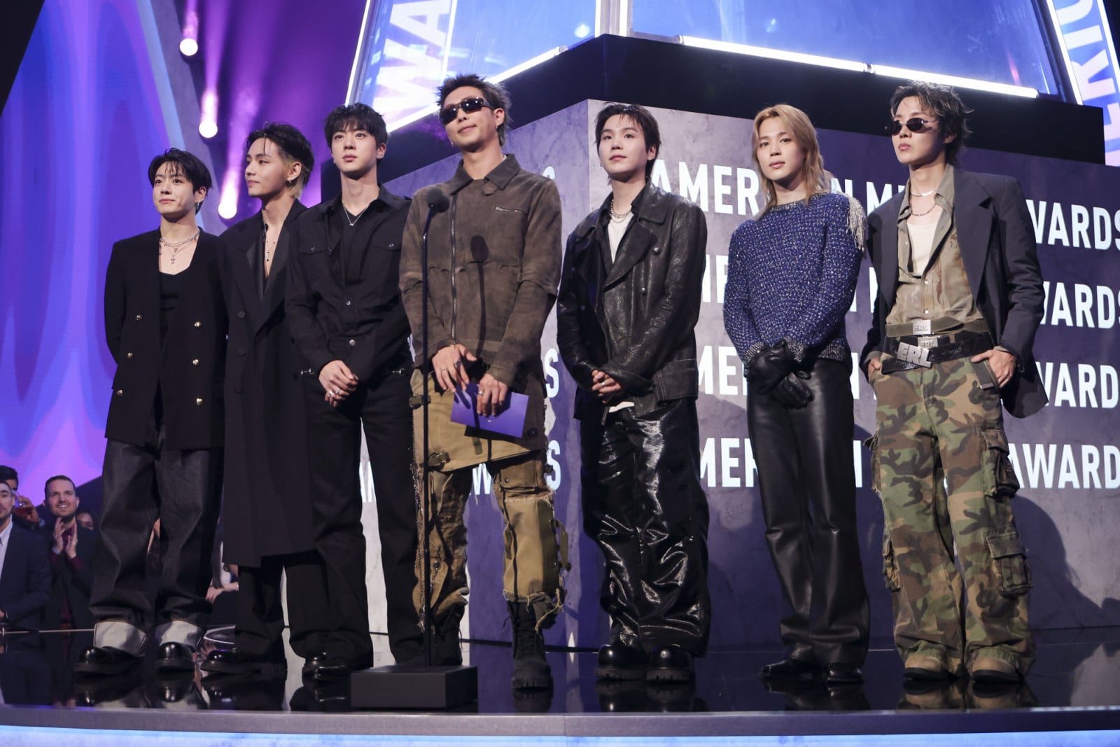 Jung Kook, V, Jin, RM, Suga, Jimin and J-Hope of BTS speak on stage at The 52nd American Music Awards held at the MGM Grand Garden Arena on May 25, 2026 in Las Vegas, Nevada. (Photo by Christopher Polk/Dick Clark Productions via Getty Images)
