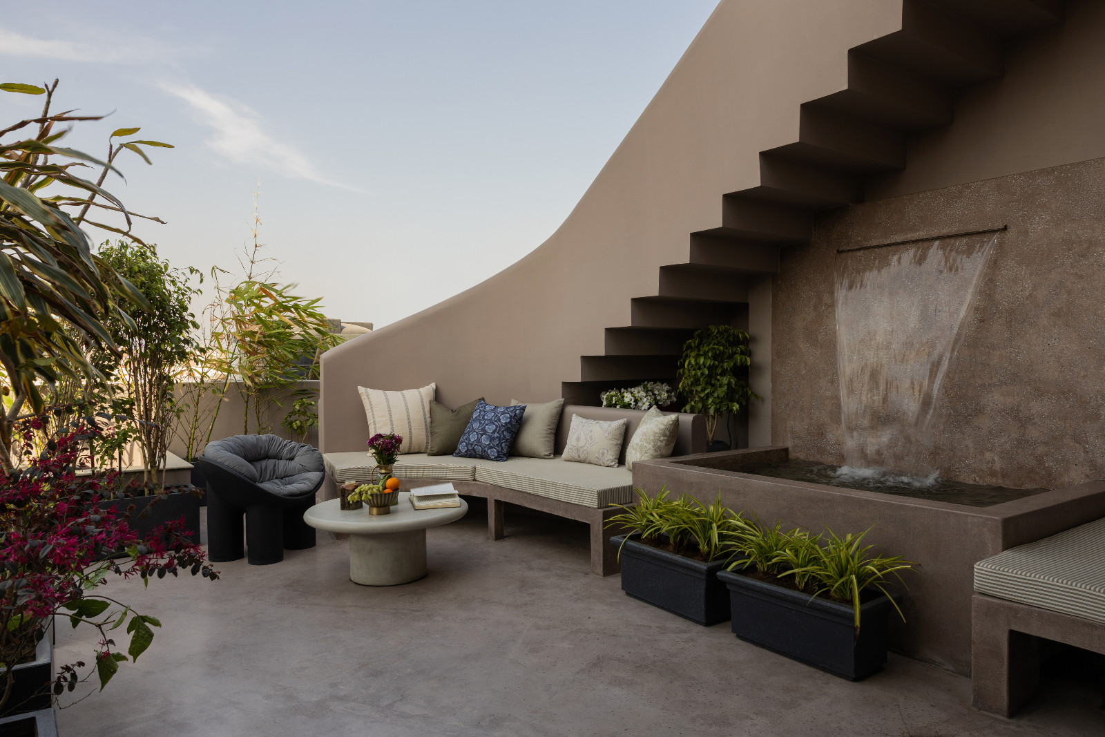 The outdoor lounge of a Meerut, India home designed by Rhythm and Light