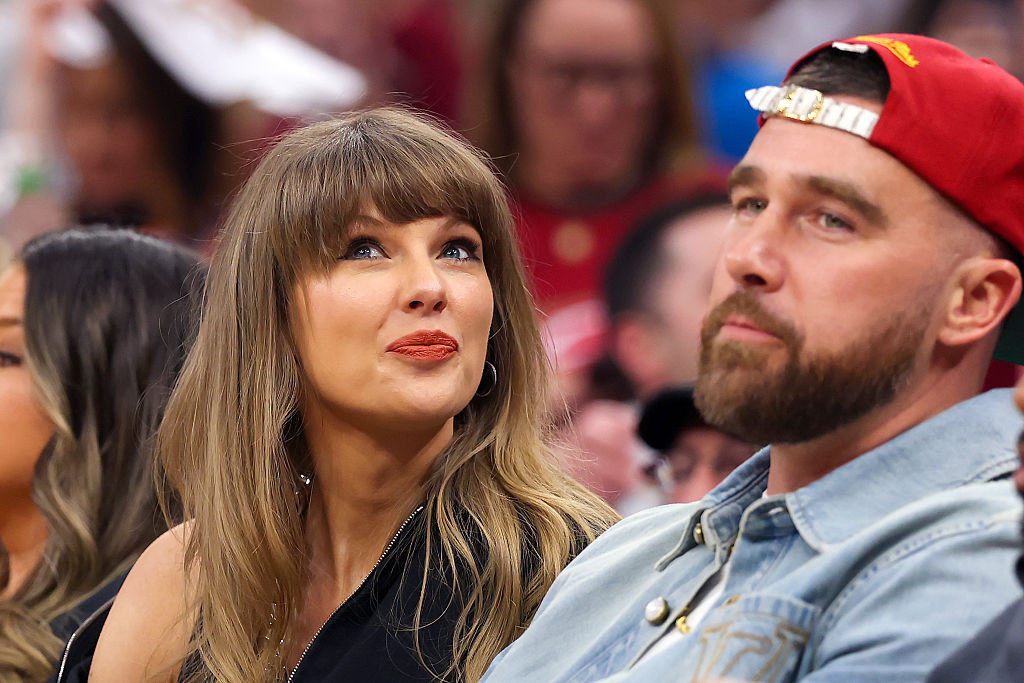 Singer Taylor Swift and Travis Kelce of the Kansas City Chiefs attend Game Three between the New York Knicks and the Cleveland Cavaliers in the NBA Eastern Conference Finals at Rocket Arena on May 23, 2026 in Cleveland, Ohio. (Photo by Gregory Shamus/Getty Images)