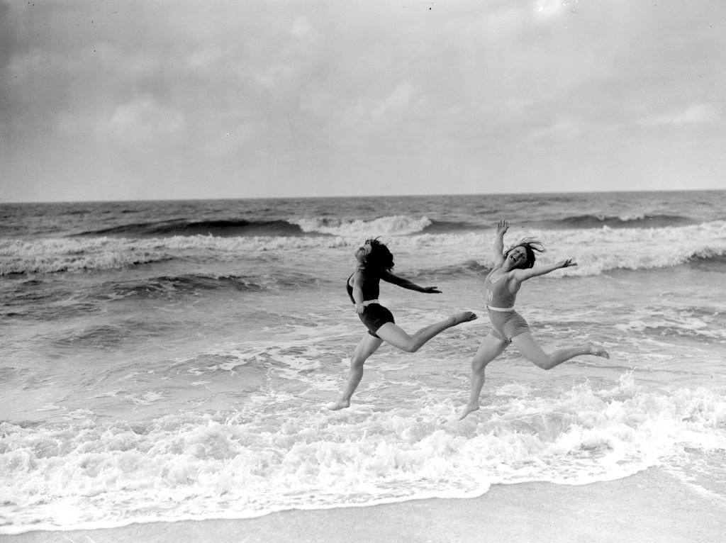 August 1929: Margaret Morris dancers exercising on the sands at Saint-Idesbald. (Photo by Fox Photos/Getty Images)