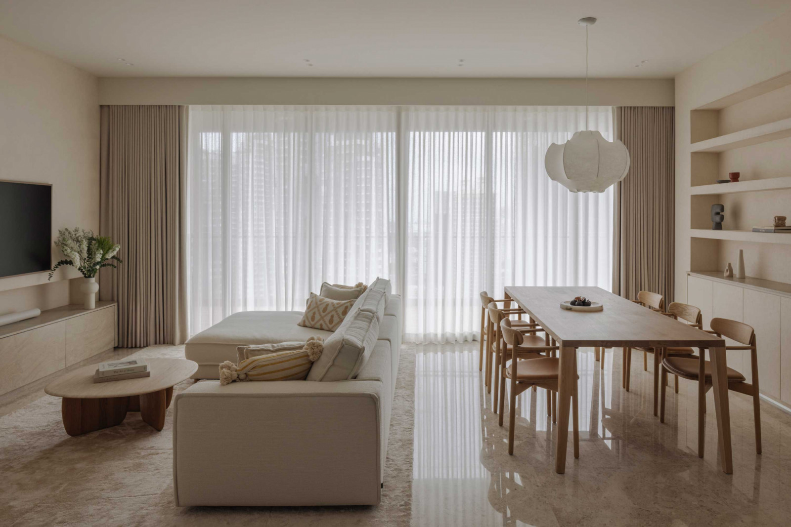 Timber, stone and textiles define the apartment