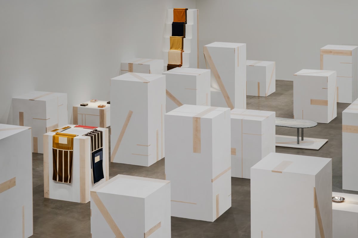 Part workshop, part gallery and part vault of unboxed mysteries, Hermès’ 2026 Milan Design Week showcase at La Pelota presents the Collections for the Home across some 30 plaster volumes arranged in a loose grid across the former jai alai court on Via Palermo