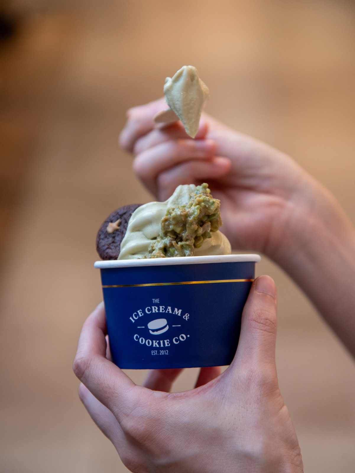 The Ice Cream & Cookie Co., established 2012, offers soft serve ice cream with various toppings.