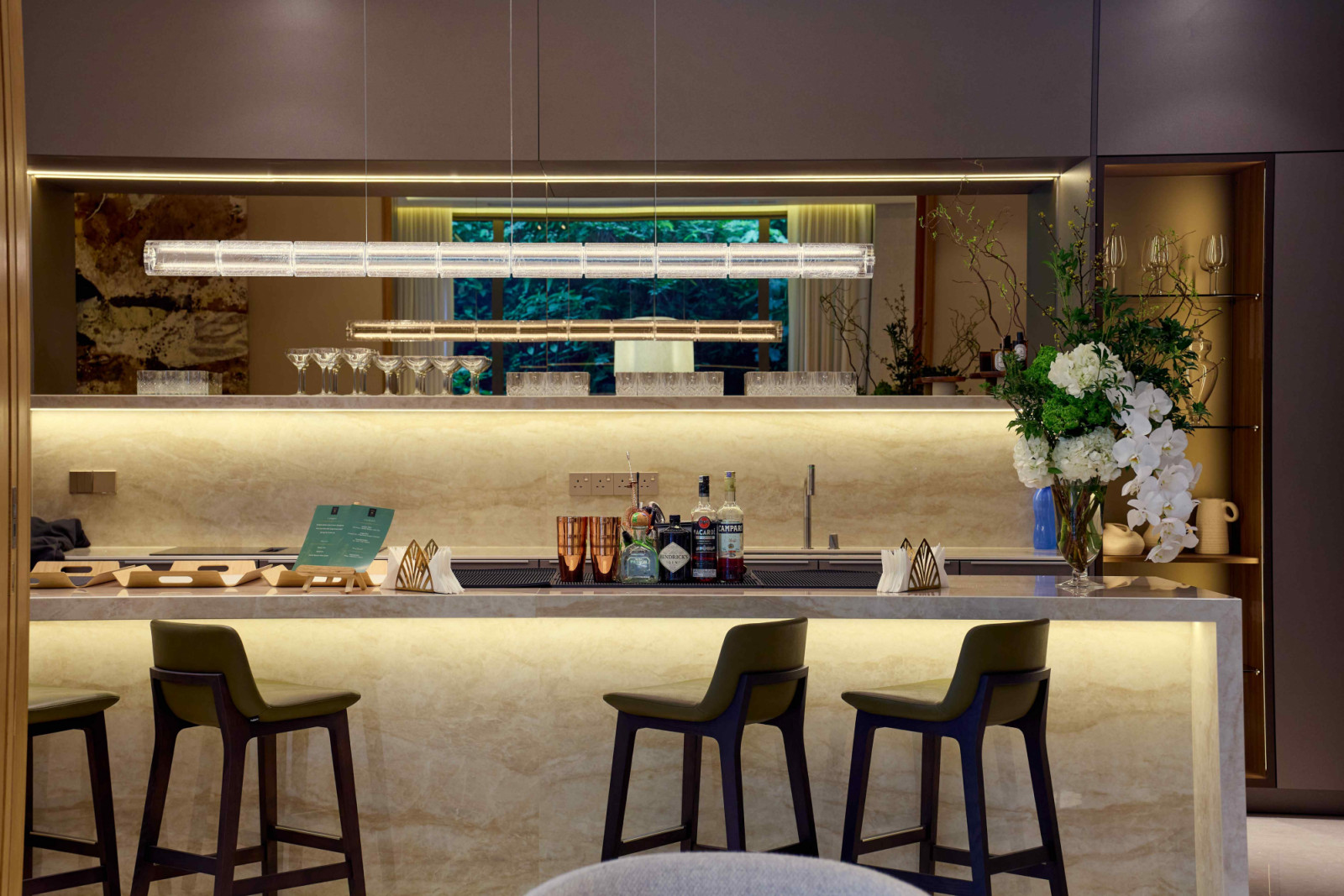 The kitchen area with Gaggenau appliances within a Poggenpohl kitchen system
