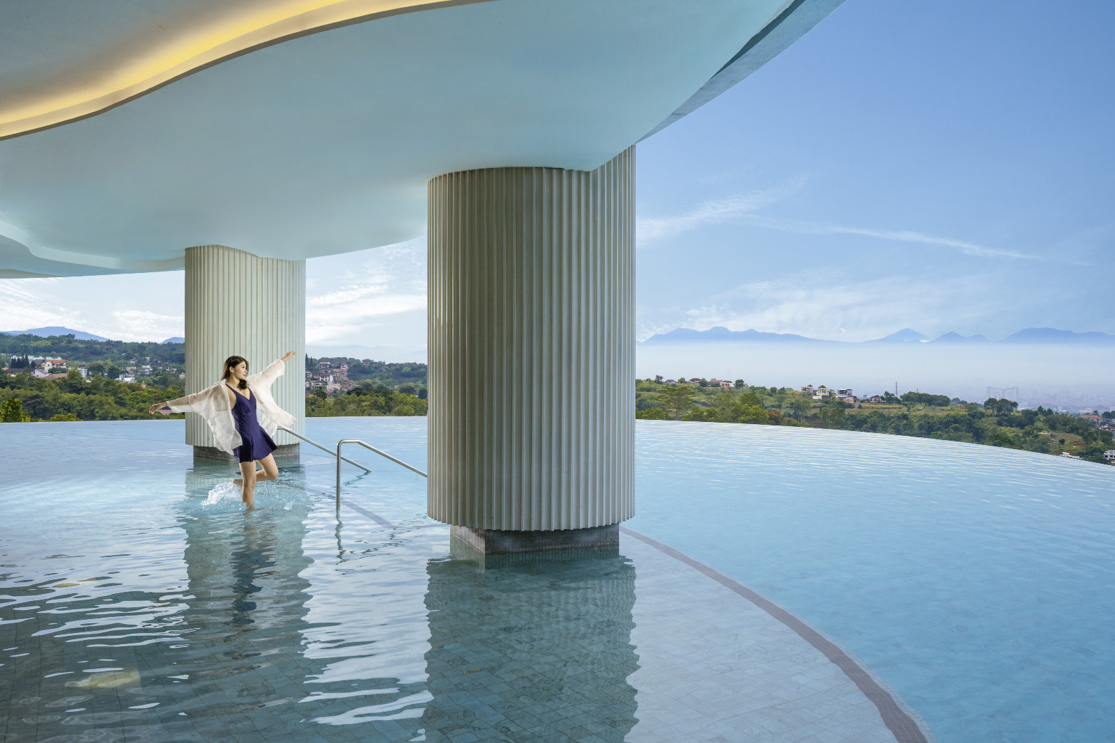 At Hotel Indigo Bandung Dago Pakar, every swim comes with a breathtaking hillside view