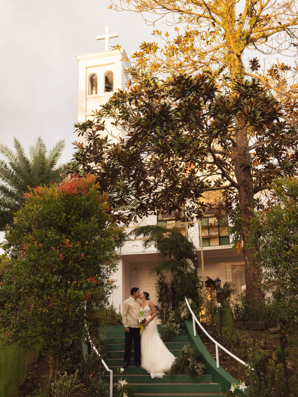 Tatler Weddings - Sabina Yulo and Enrique Mathay - Couple in front of St Joseph Church by Joseph Pascual
