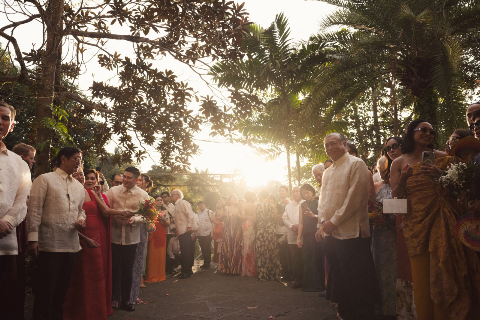 Tatler Weddings - Sabina Yulo and Enrique Mathay - Guests waiting for couple outside church by Joseph Pascual