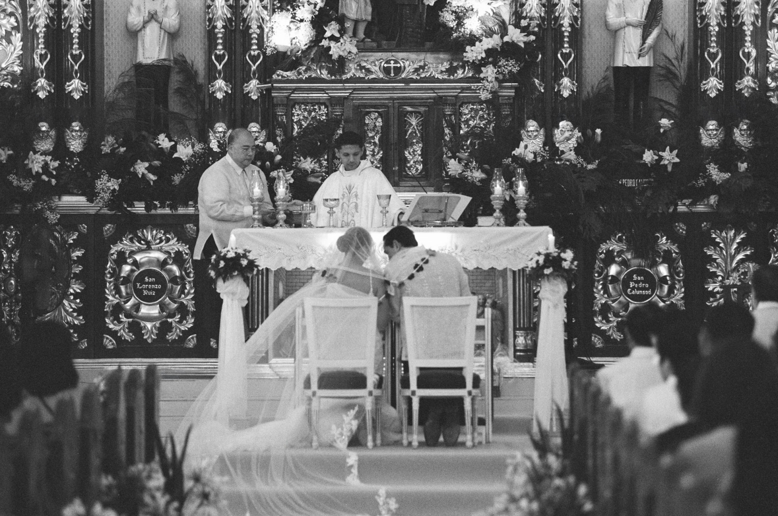 Tatler Weddings - Sabina Yulo and Enrique Mathay - JJ Yulo and Father Luis Lorenzo. Mass by Trasienne Estrada